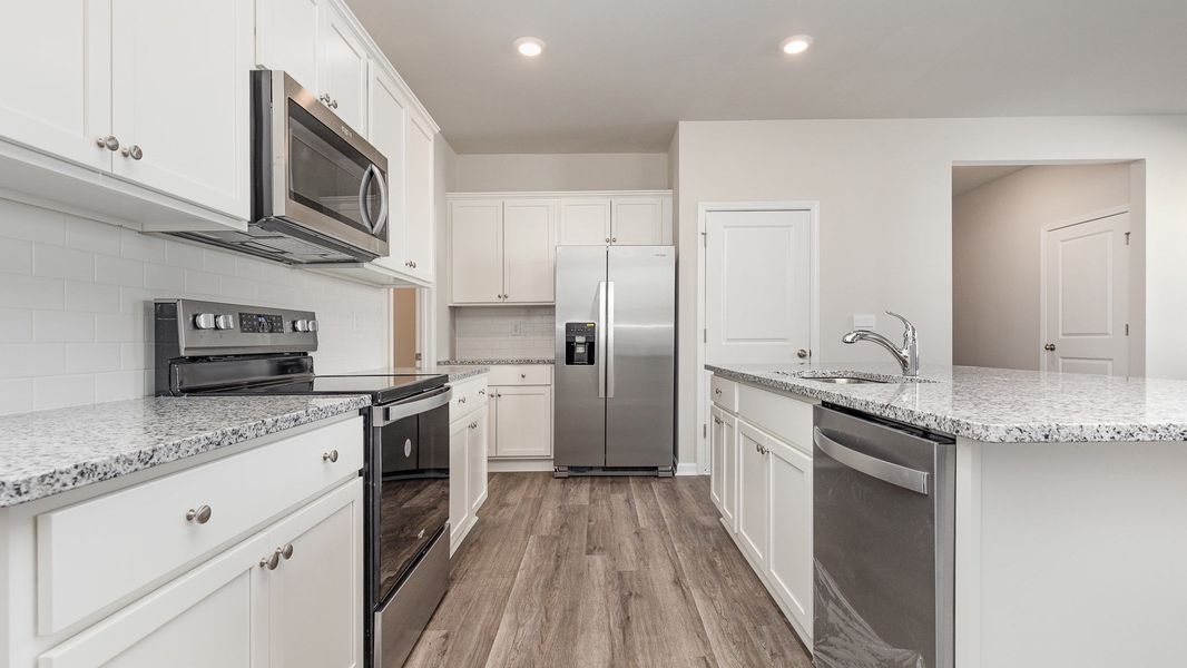 Furnished interior view inside a new home in Sandridge Park, Little River (Image 6).
