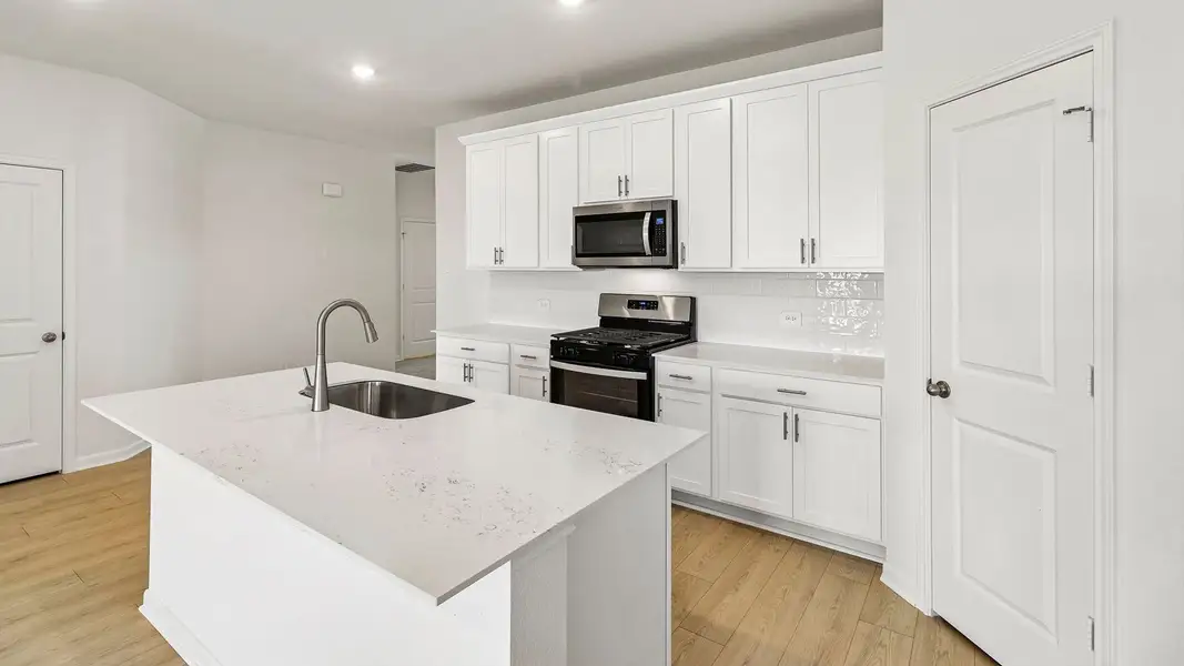 Furnished interior view inside a new home in Briarwood, Elgin (Image 8).
