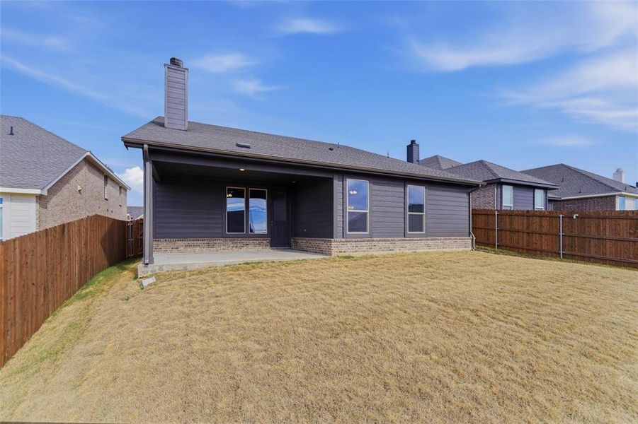 Exterior details and patio area of a home in Liberty Pointe, Gainesville (Image 23).