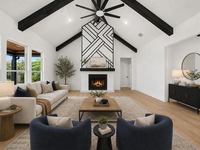 Vaulted ceiling with exposed black beams, central fireplace feature with a geometric accent wall, recessed lighting, and wood-finish flooring Vaulted ceiling with exposed black beams, central fireplace feature with a geometric accent wall, recessed lighting, and wood-finish flooring