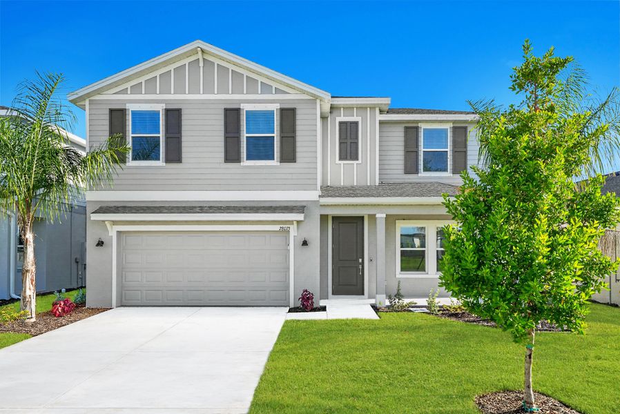 Front exterior of a new home in Willow, Punta Gorda, FL, highlighting curb appeal (Image 1). Front exterior of a new home in Willow, Punta Gorda, FL, highlighting curb appeal (Image 1).