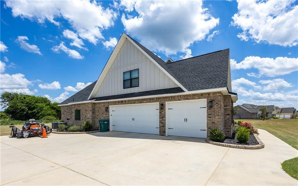 Front exterior of a new home in , Kathleen, GA, highlighting curb appeal (Image 1).