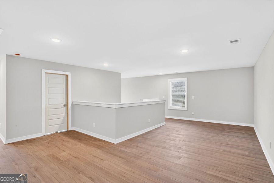 Spacious, unfurnished interior of a new home in The Fairways at Mirror Lake, Villa Rica (Image 52). Spacious, unfurnished interior of a new home in The Fairways at Mirror Lake, Villa Rica (Image 52).