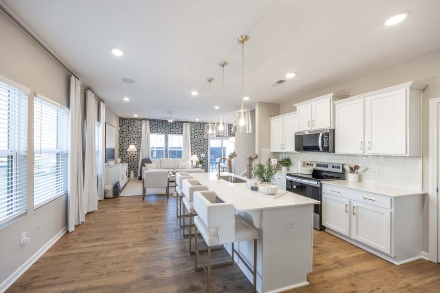 Furnished interior view inside a new home in Village Heights TH, Greensboro (Image 2).
