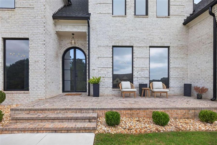 Exterior details and patio area of a home in , Hoschton (Image 36).