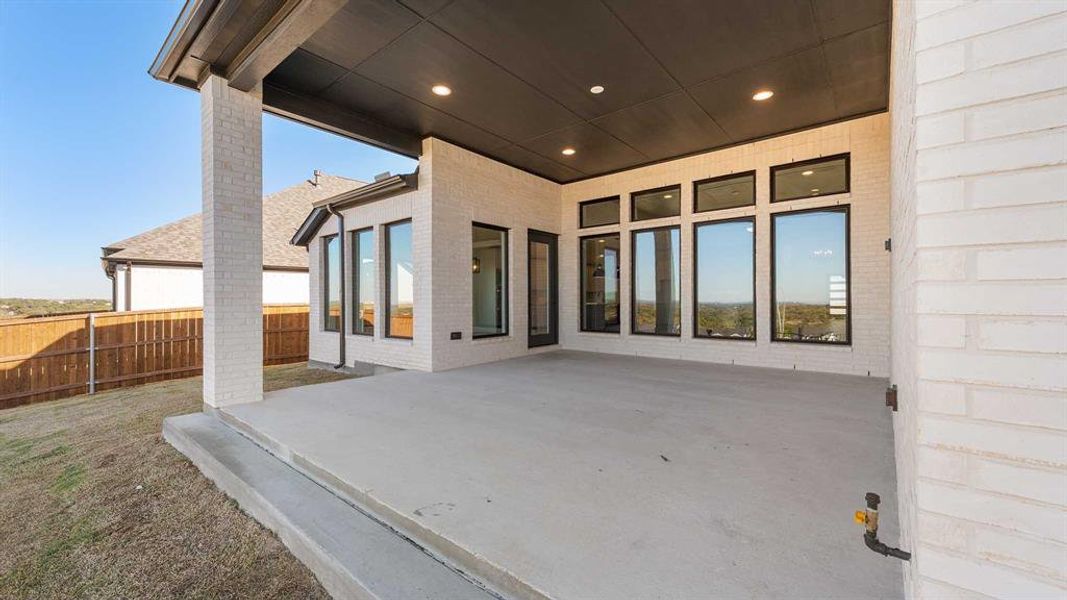 Exterior details and patio area of a home in Talon Hills 60'/70', Fort Worth (Image 3).