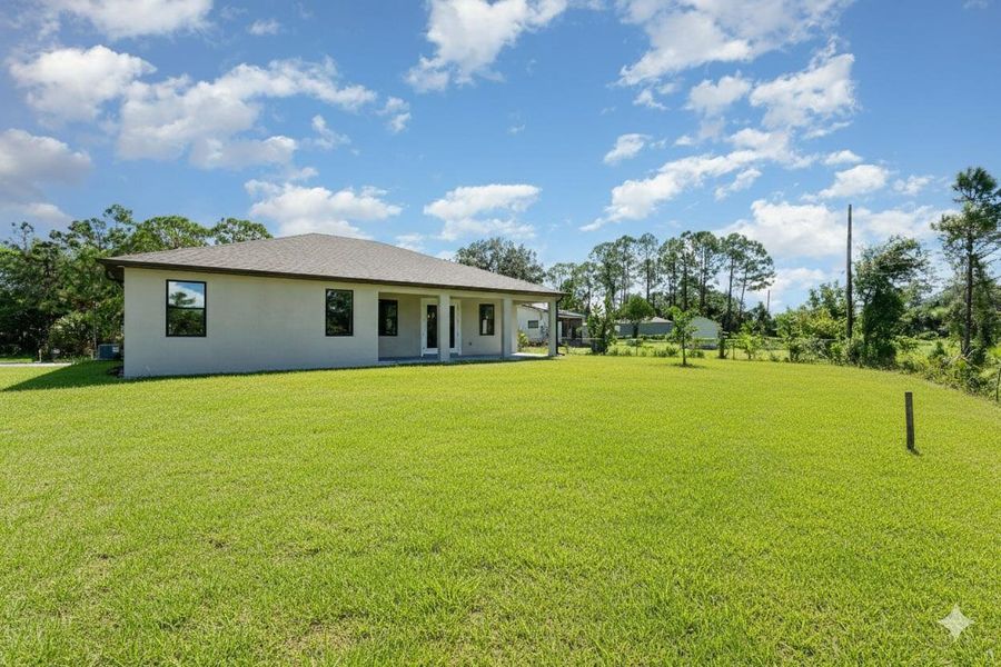 Exterior details and patio area of a home in , Palm Bay (Image 24). Exterior details and patio area of a home in , Palm Bay (Image 24).