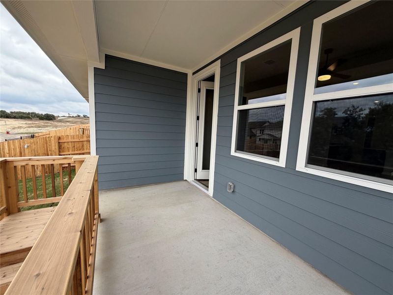 Exterior details and patio area of a home in Cannon Ranch 40s, Dripping Springs (Image 15).