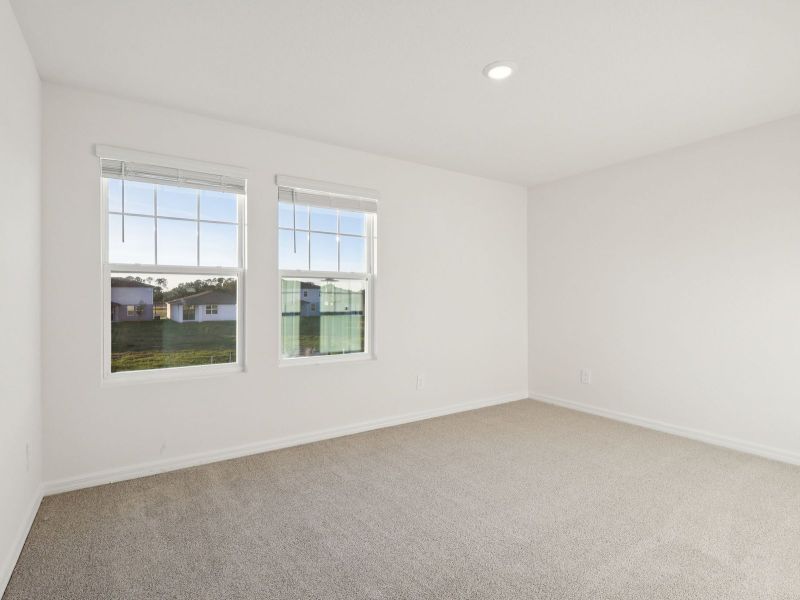 Spacious, unfurnished interior of a new home in Hamilton Bluff - Signature Series, Haines City (Image 10).