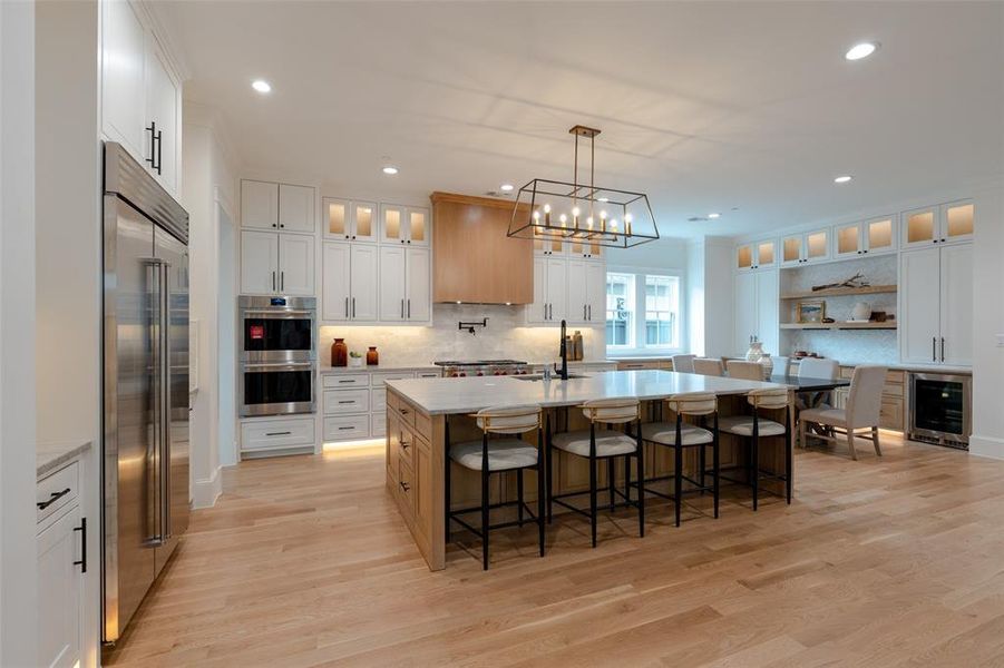 Subzero refrigerator, Wolf double oven, fabulous kitchen island.