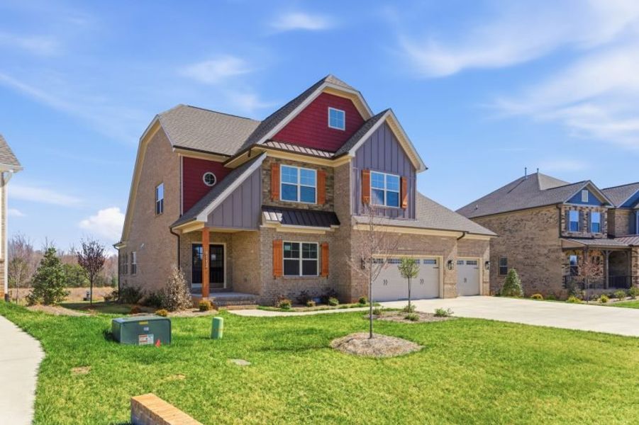 Representative exterior photo of a completed home built from the Hampton by Keystone Homes NC in Preserve at Carriage Cove, Oak Ridge, NC (Image 37).
