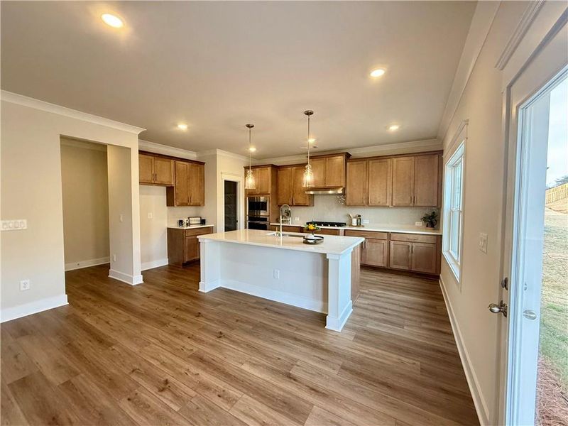 Furnished interior view inside a new home in Ponderosa Farms Manor, Gainesville (Image 4).