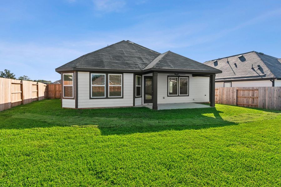 Exterior details and patio area of a home in Moran Ranch, Willis (Image 2). Exterior details and patio area of a home in Moran Ranch, Willis (Image 2).