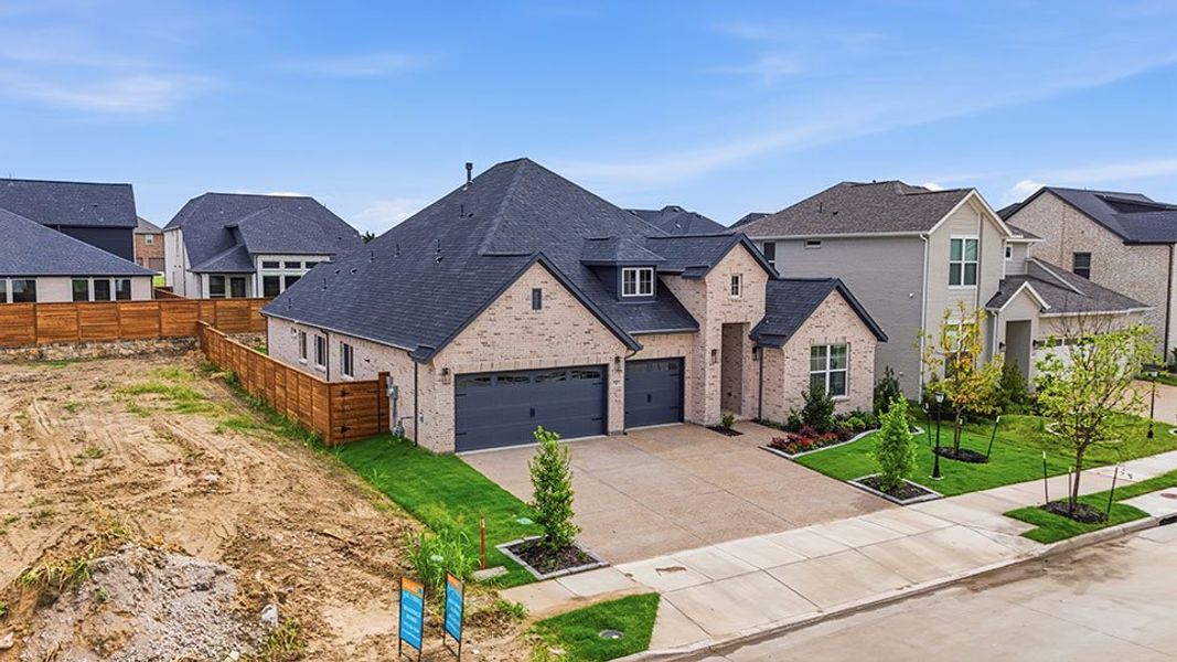 Front exterior of a new home in Solterra Texas, Mesquite, TX, highlighting curb appeal (Image 25).