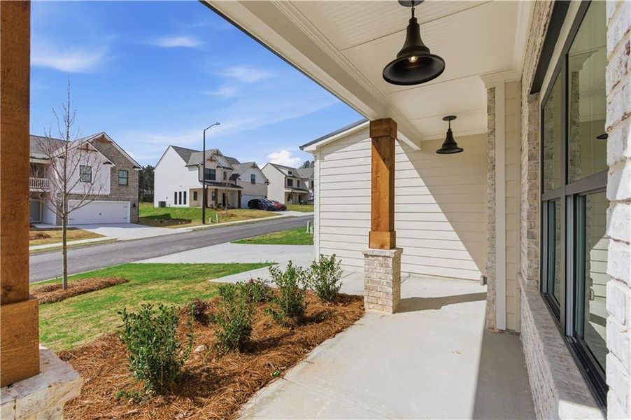 Exterior details and patio area of a home in The Overlook at Factory Shoals, Mableton (Image 25).