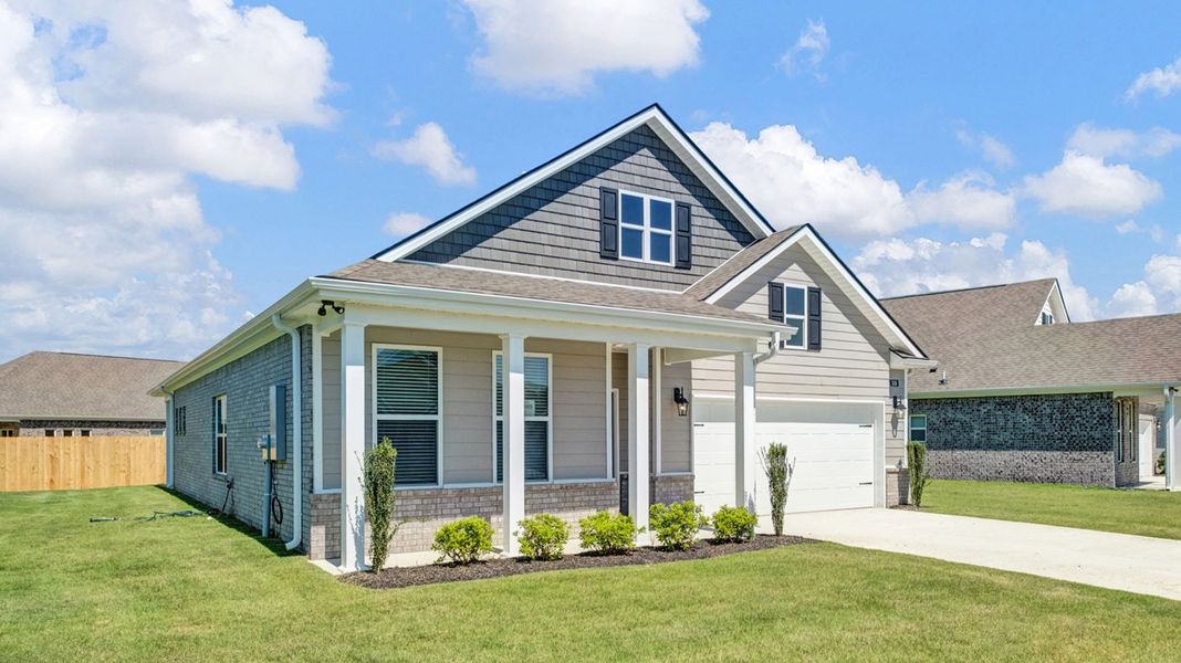 Front exterior of a new home in Riverwood Gardens, Oakland, TN, highlighting curb appeal (Image 2).
