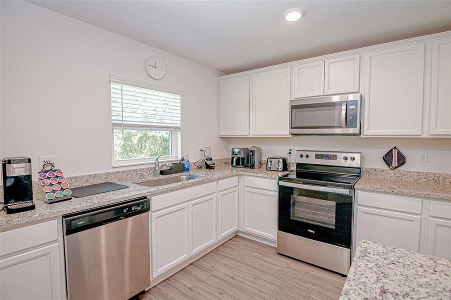 Furnished interior view inside a new home in , Kissimmee (Image 6).