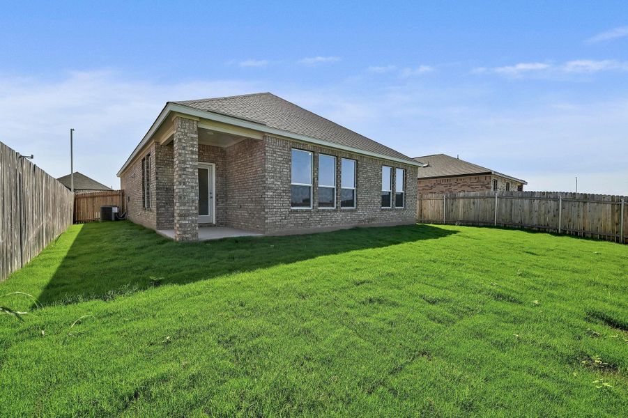 Front exterior of a new home in Centerpoint Meadows, Lockhart, TX, highlighting curb appeal (Image 16). Front exterior of a new home in Centerpoint Meadows, Lockhart, TX, highlighting curb appeal (Image 16).