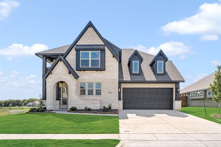 Front exterior of a new home in Hunters Ridge, Crowley, TX, highlighting curb appeal (Image 24).