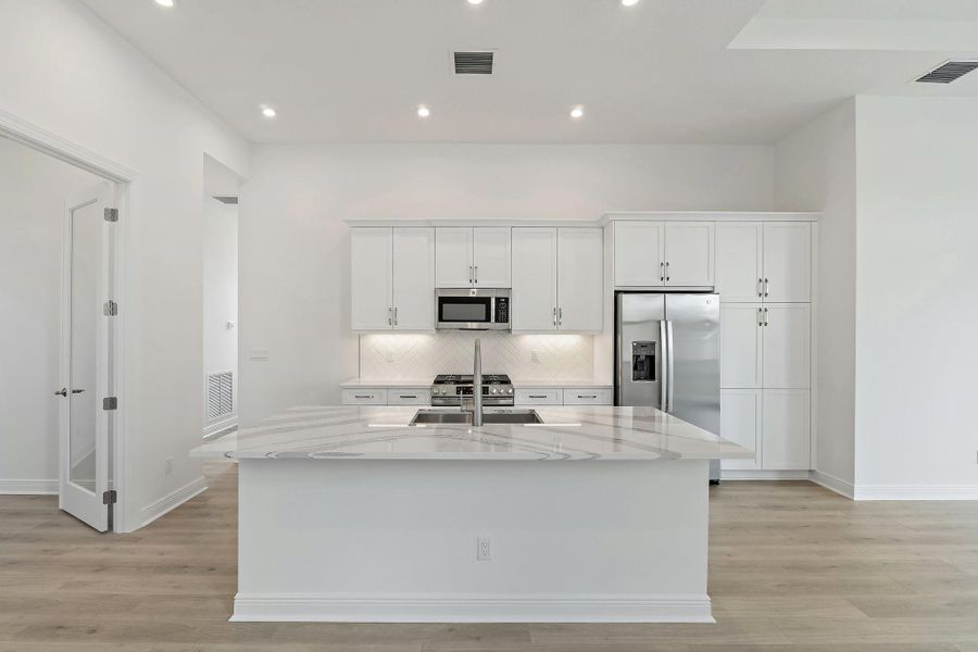 Furnished interior view inside a new home in , Port St. Lucie (Image 6).