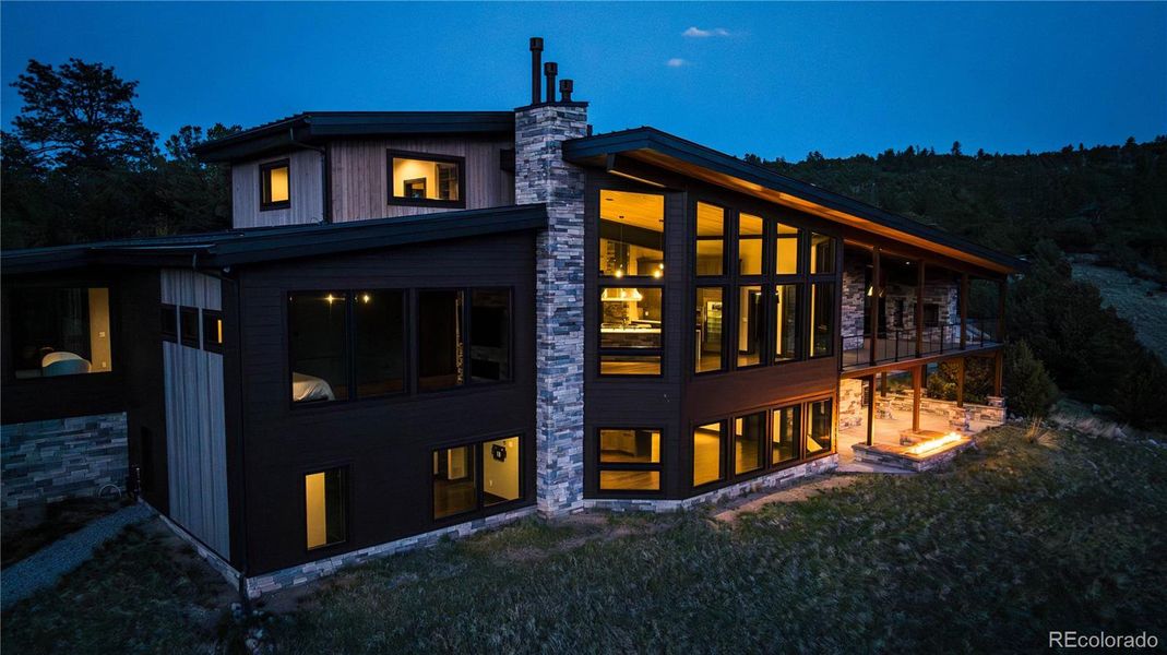 Evening view of the exterior of the property Evening view of the exterior of the property