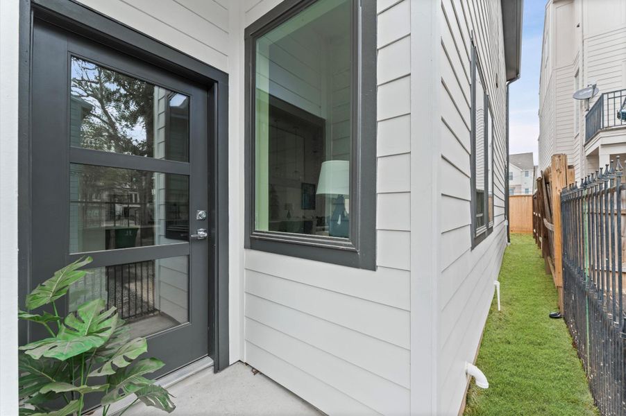 Exterior details and patio area of a home in , Houston (Image 2). Exterior details and patio area of a home in , Houston (Image 2).