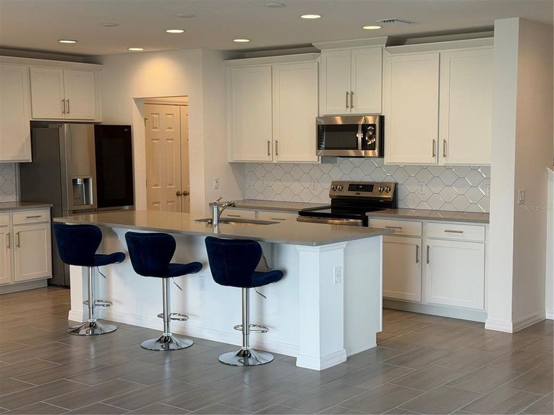 Furnished interior view inside a new home in , Davenport (Image 17).