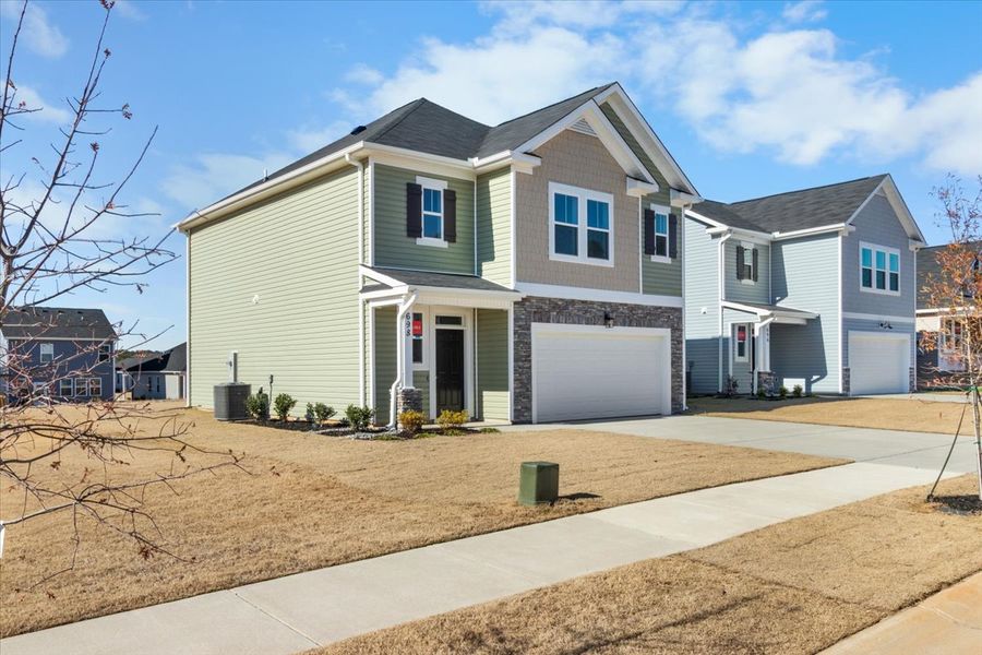 Front exterior of a new home in Windsor, North Augusta, SC, highlighting curb appeal (Image 17).