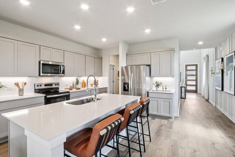 Furnished interior view inside a new home in Stallion Run, Buda (Image 16).