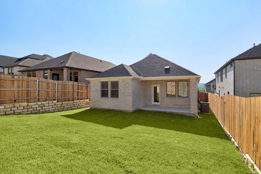 Exterior details and patio area of a home in Lakeside at Tessera, Lago Vista (Image 28).