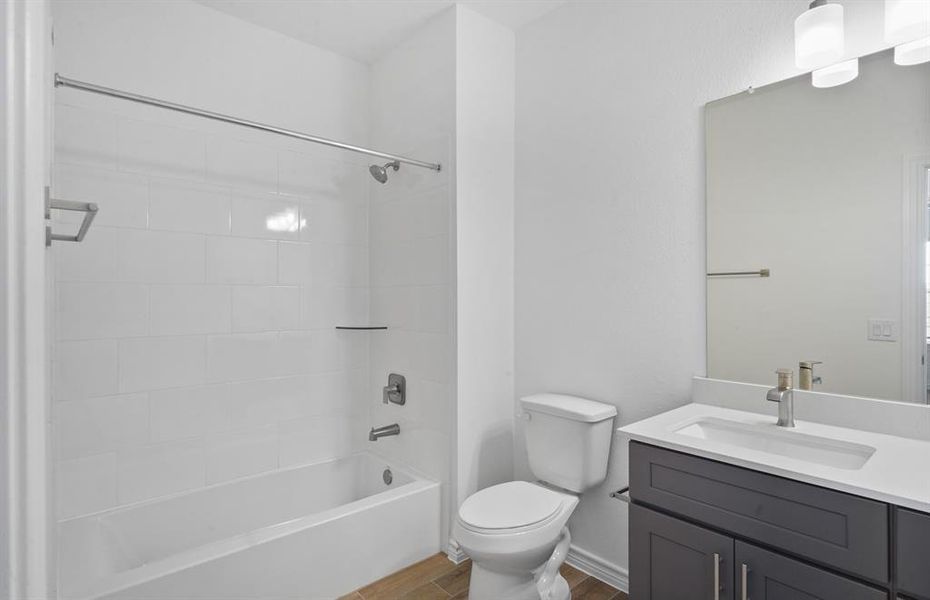 Furnished interior view inside a new home in Sunterra, Katy (Image 5).