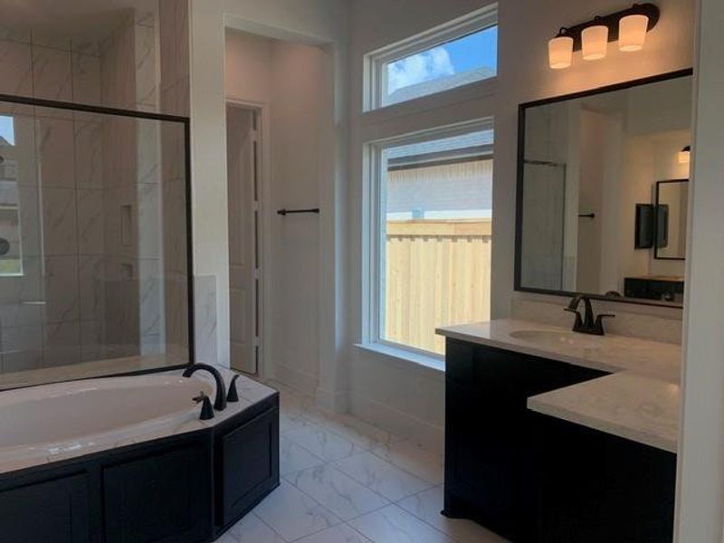 Furnished interior view inside a new home in Dunham Pointe, Cypress (Image 11).