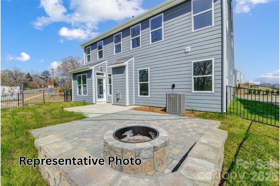 Exterior details and patio area of a home in Enclave at Riverdale, Huntersville (Image 20).