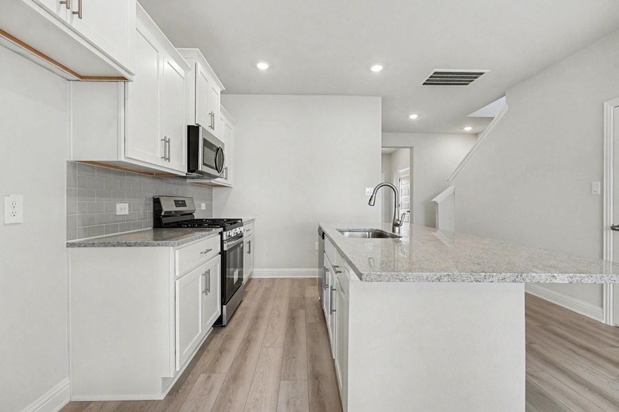 Furnished interior view inside a new home in Bayou Maison, Dickinson (Image 3).