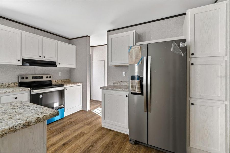 Furnished interior view inside a new home in , Williston (Image 7).
