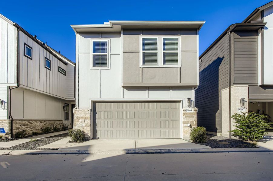 Front exterior of a new home in , Houston, TX, highlighting curb appeal (Image 25).