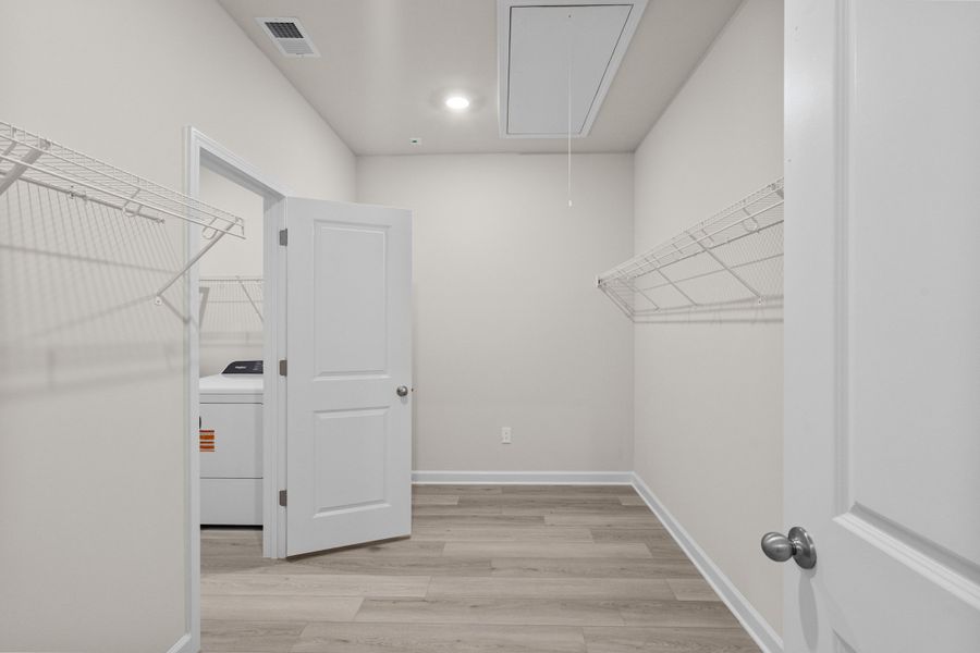 Spacious, unfurnished interior of a new home in Cypress Ridge - The Coastline Series, Longs (Image 22).