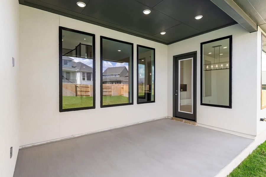 Exterior details and patio area of a home in Lariat - 70', Liberty Hill (Image 2). Exterior details and patio area of a home in Lariat - 70', Liberty Hill (Image 2).