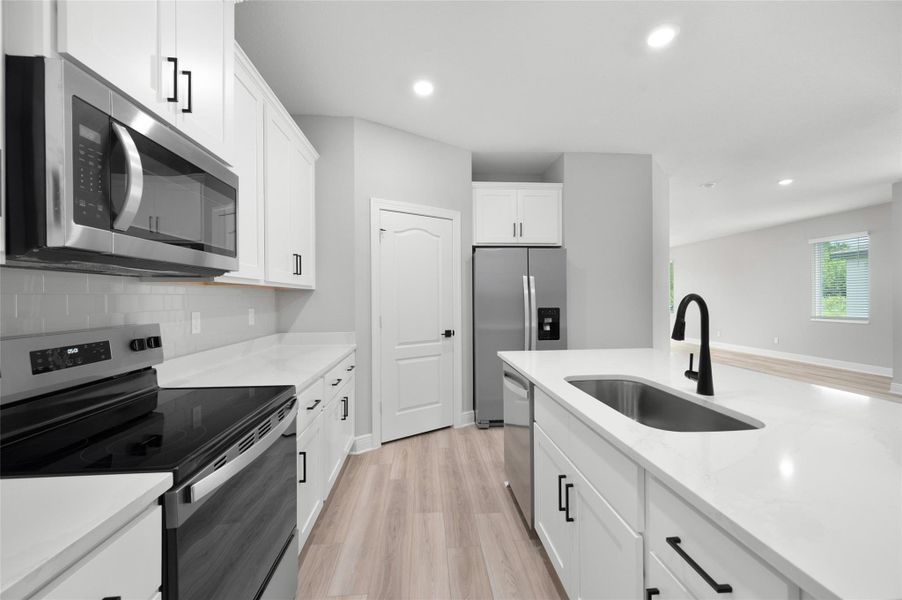 Furnished interior view inside a new home in Celebration Pointe, Fort Pierce (Image 8). Furnished interior view inside a new home in Celebration Pointe, Fort Pierce (Image 8).