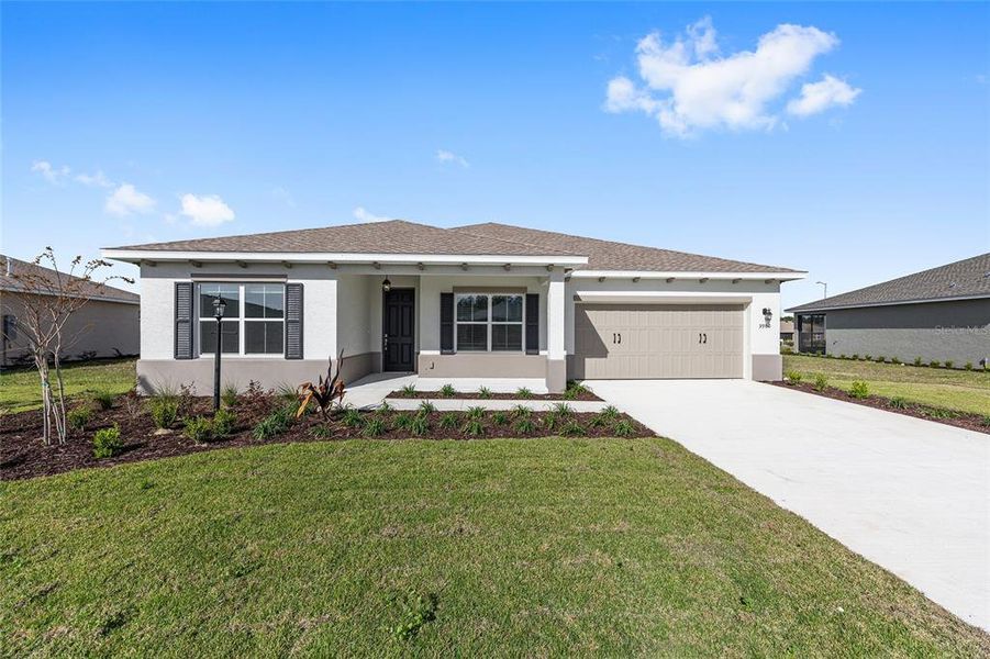 Front exterior of a new home in , Ocala, FL, highlighting curb appeal (Image 17).