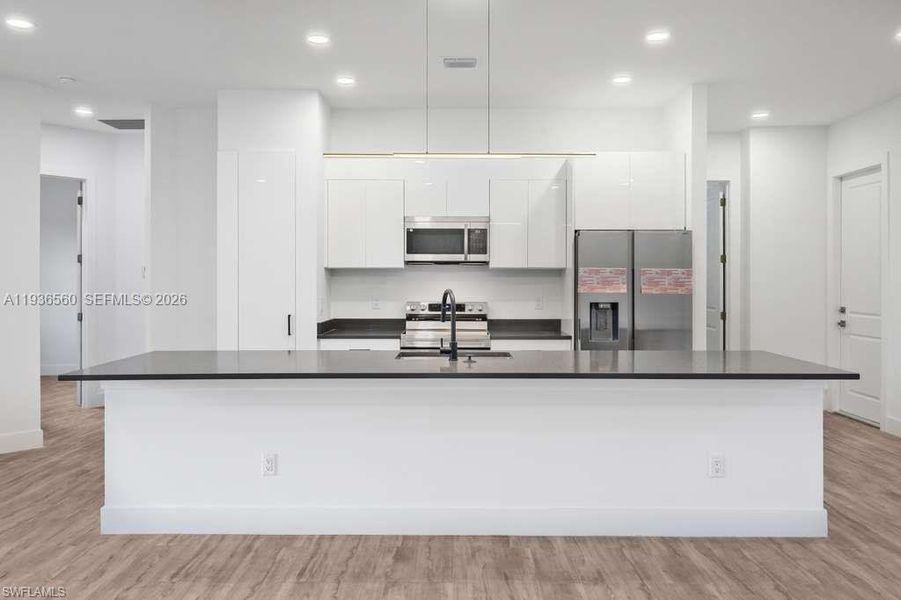 Furnished interior view inside a new home in , Lehigh Acres (Image 7). Furnished interior view inside a new home in , Lehigh Acres (Image 7).