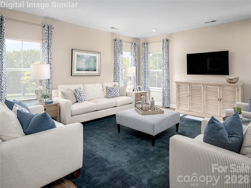 Gather with family and friends in this sunlit, open-concept floorplan — large windows and seamless flow mean you’ll never miss a conversation.