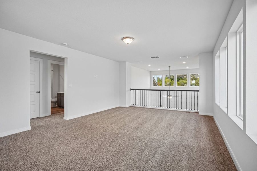 Spacious, unfurnished interior of a new home in The Meadows at Hunters Ranch, San Antonio (Image 37).