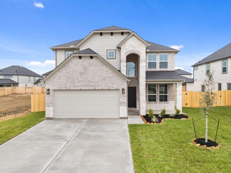 Front exterior of a new home in Briarwood Crossing, Rosenberg, TX, highlighting curb appeal (Image 16).