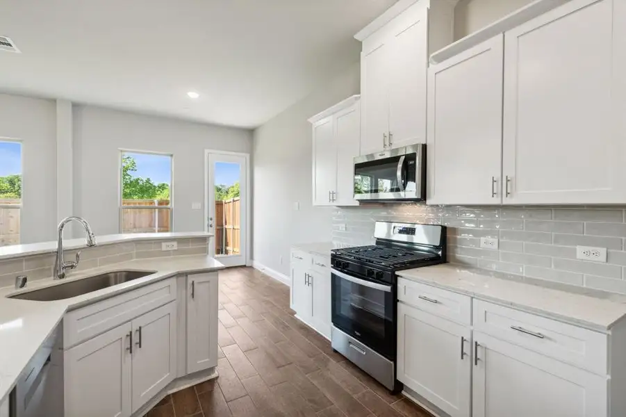Furnished interior view inside a new home in Villas of Middleton, Plano (Image 8).