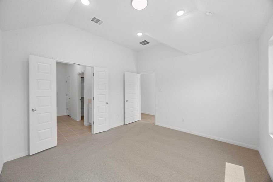 Primary Suite in the Cypress home plan by Trophy Signature Homes - REPRESENTATIVE PHOTO