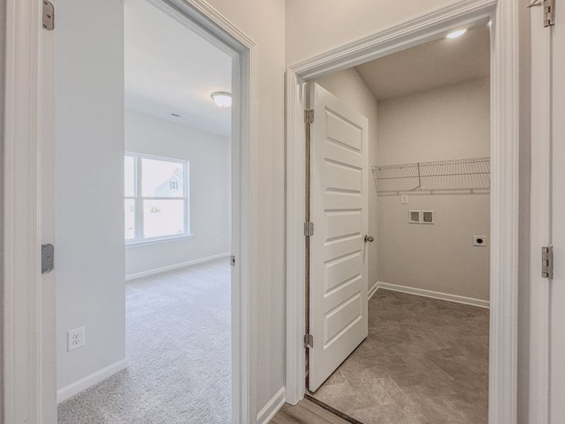 Representative unfurnished interior of a home built from the The Hampton by Smith Douglas Homes in Enclave at Willis, Willis (Image 13).