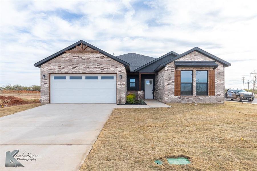 Front exterior of a new home in , Abilene, TX, highlighting curb appeal (Image 1). Front exterior of a new home in , Abilene, TX, highlighting curb appeal (Image 1).
