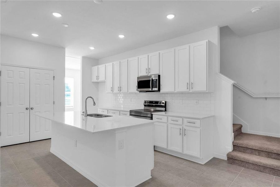 Furnished interior view inside a new home in The Residences at Emerson Park, Apopka (Image 2).