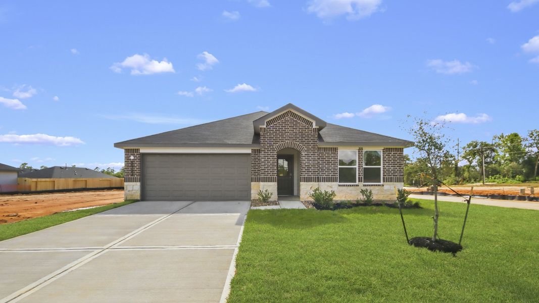Representative exterior photo of a completed home built from the Lakeway by D.R. Horton in Chapel Lakes, Montgomery, TX (Image 2). Representative exterior photo of a completed home built from the Lakeway by D.R. Horton in Chapel Lakes, Montgomery, TX (Image 2).